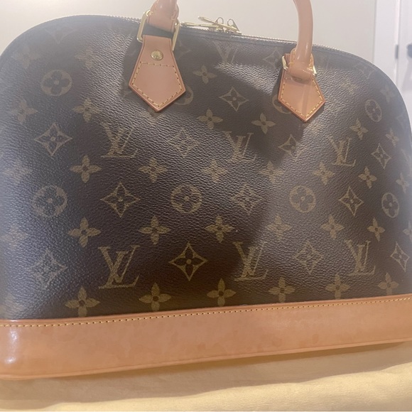 Alma Louis Vuitton Bag with original dust bag, includes Louis Vuitton gold lock - Picture 2 of 6